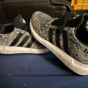 adidas Black and White Athletic Shoes with Cushioned Sole and Knitted Upper